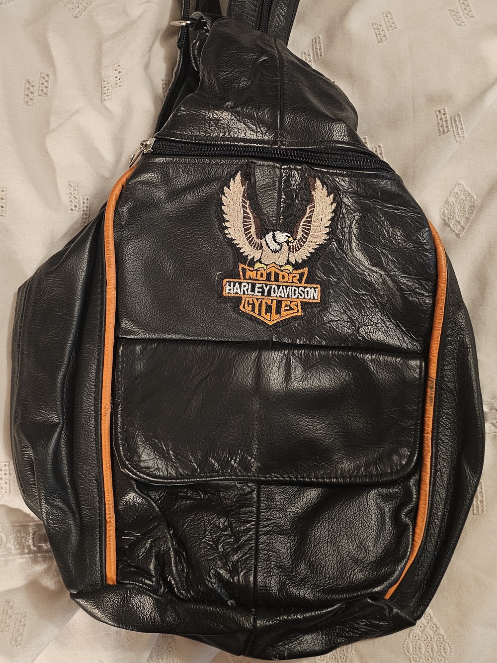 Harley-Davidson Black Sling Backpack with Orange Piping and Embroidered Eagle